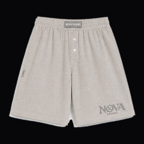 Pantalón corto de NOVA Supply Clothing, pantalón corto beige con NOVA en la pernera